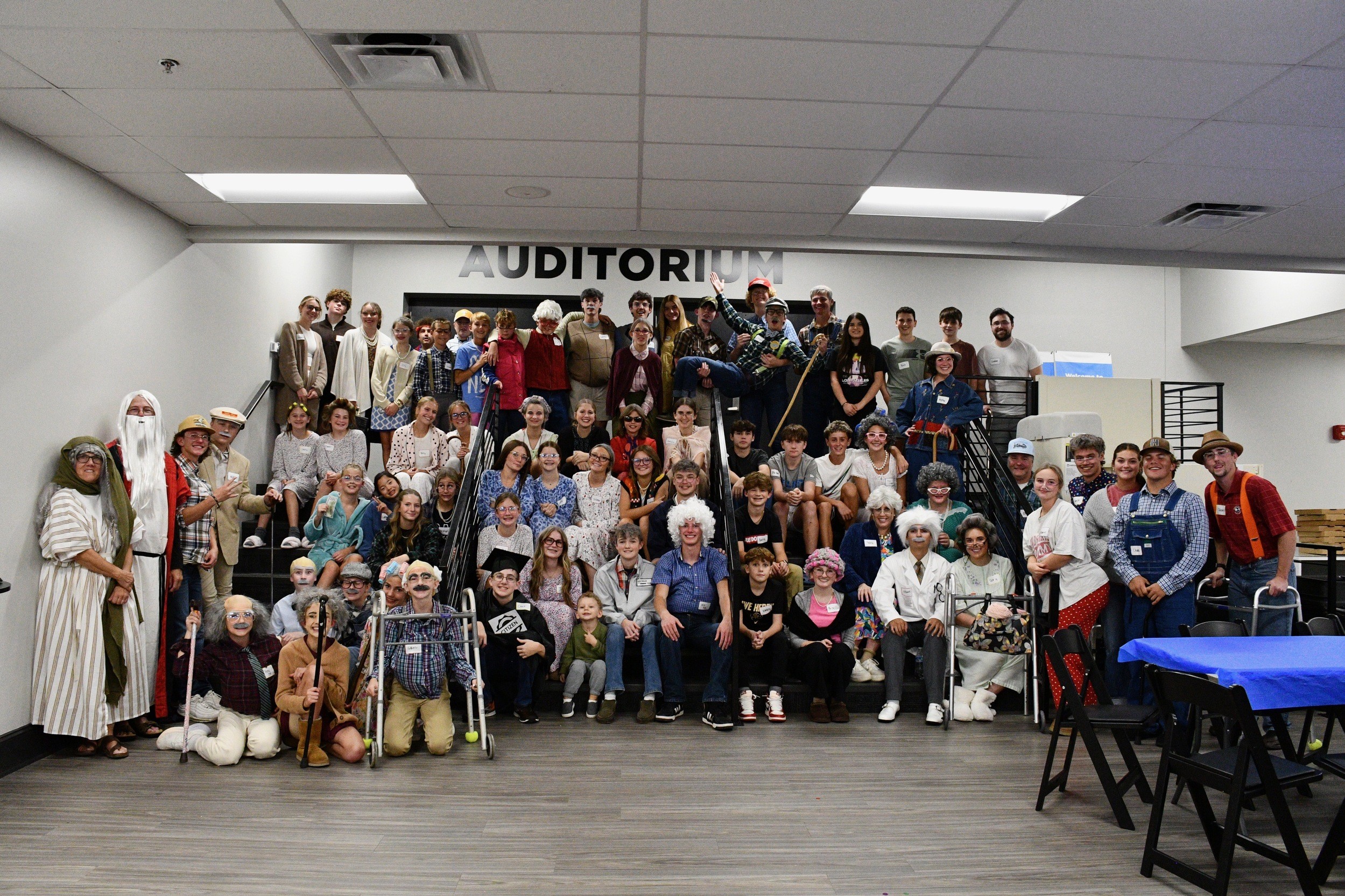 Hope Students dressed up for a themed night, posing for a group photo
